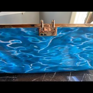 Brand New with tags! Kate Spade leather “pool” clutch with metal latter